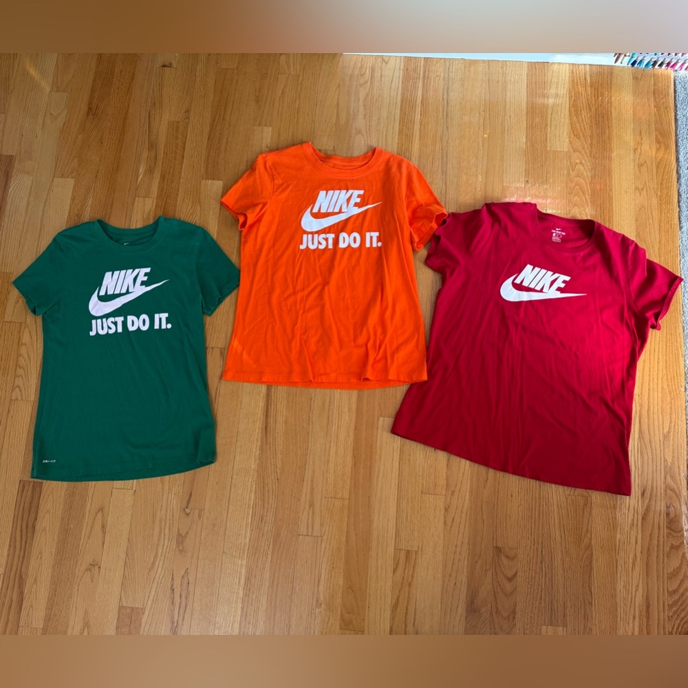 Nike T Shirts set of 3 different sizes but still fit. Orange Green Red
